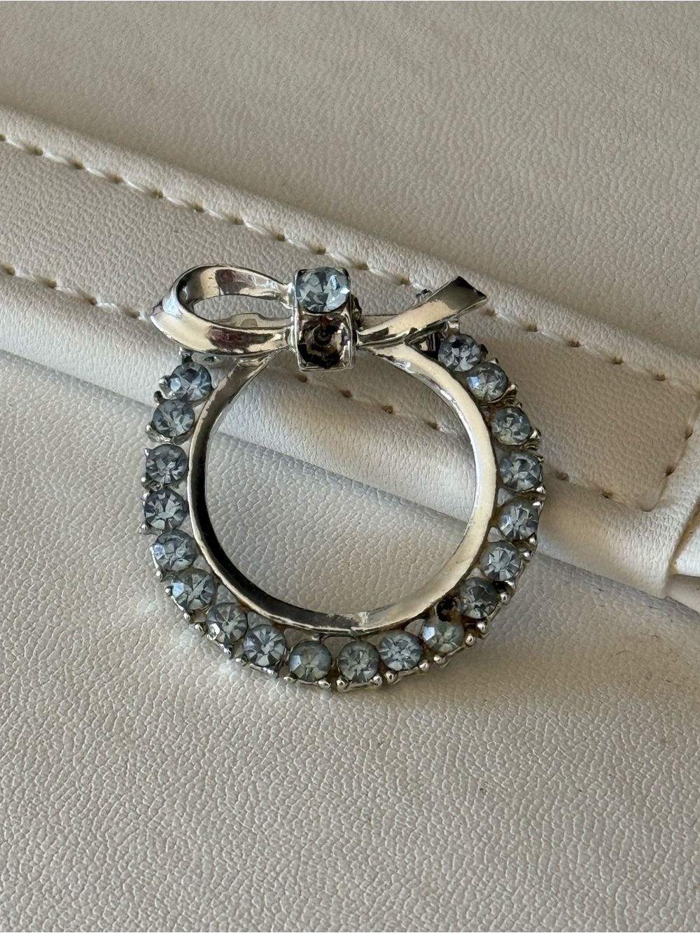 Vintage Silver and Blue Crystal Wreath Brooch with Bow Accent